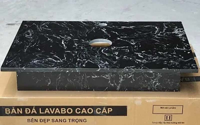 Bàn đá nhân tạo đặt bàn lavabo BĐ-014Đ có chủ đạo màu đen và vân trắng